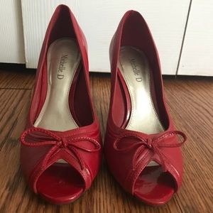 Red peep toe pumps